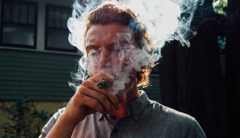 Man enjoying a cigar